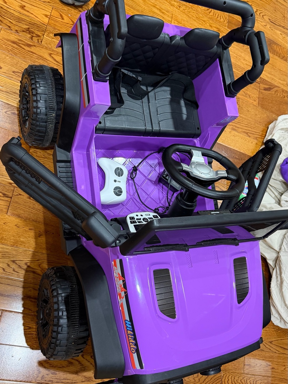 Purple Kids Ride-On Car with Remote Control